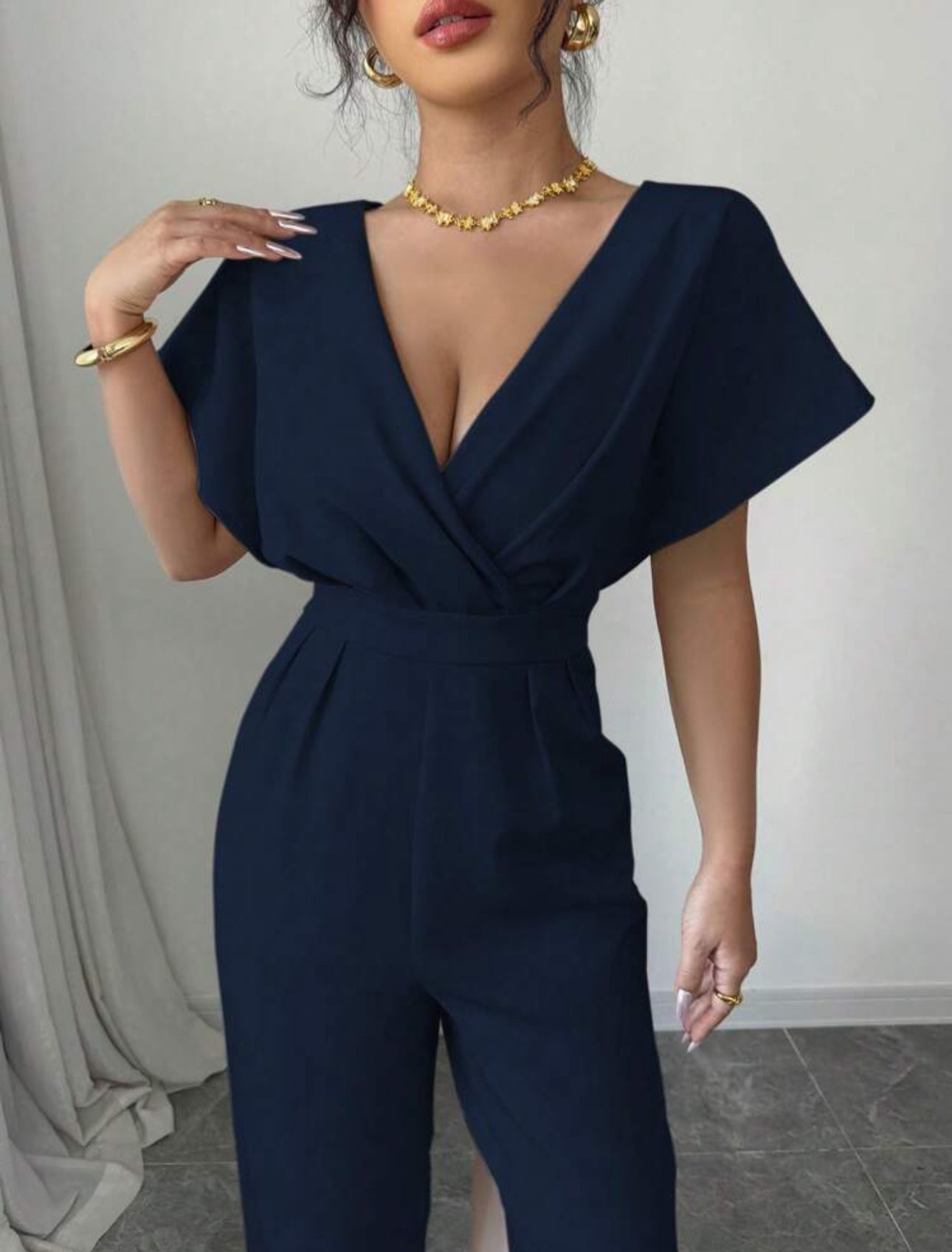 Jumpsuit azul con cinta en la cintura