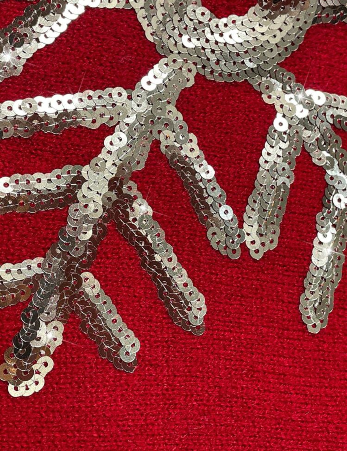 Suéter de Navidad rojo con lentejuelas