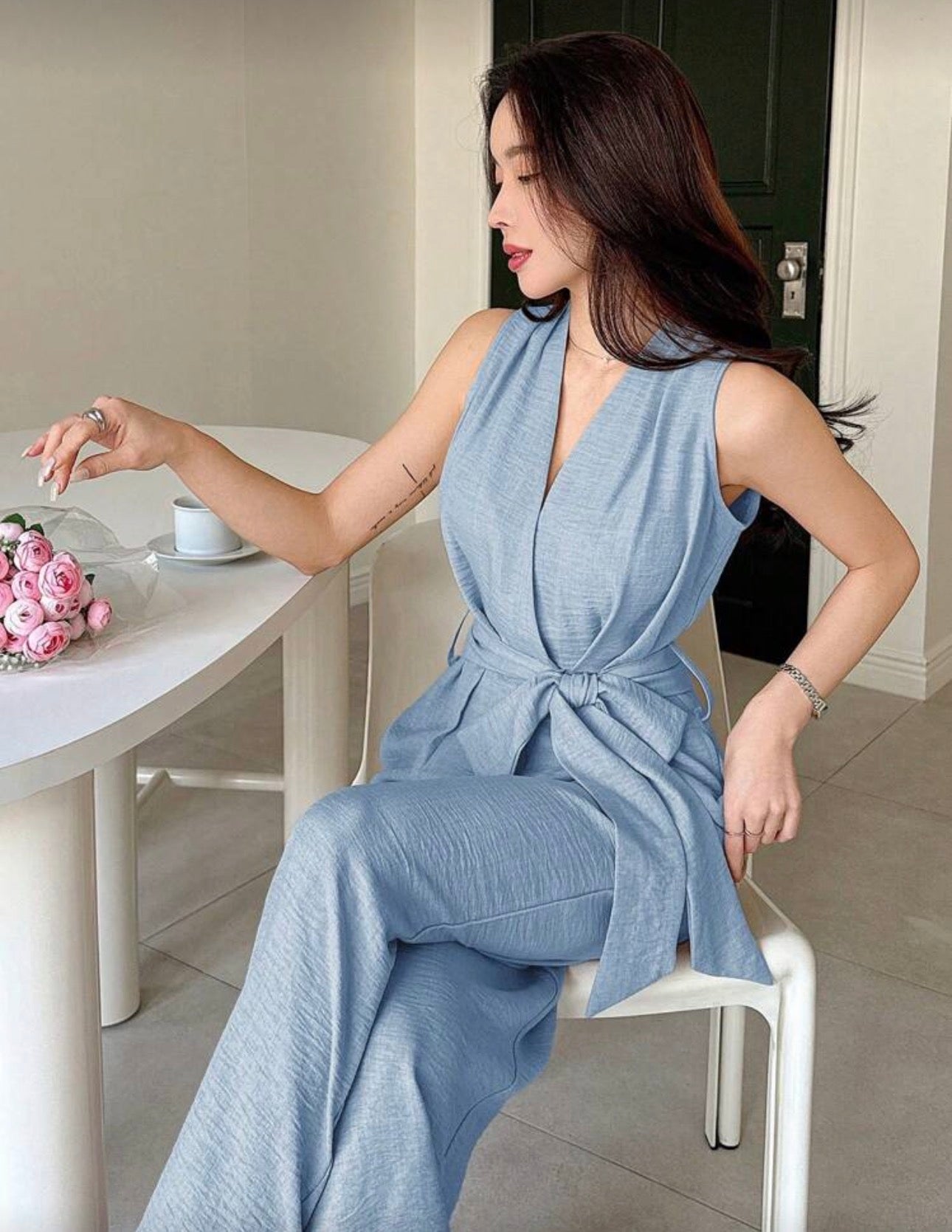 Jumpsuit azul claro con cinturón