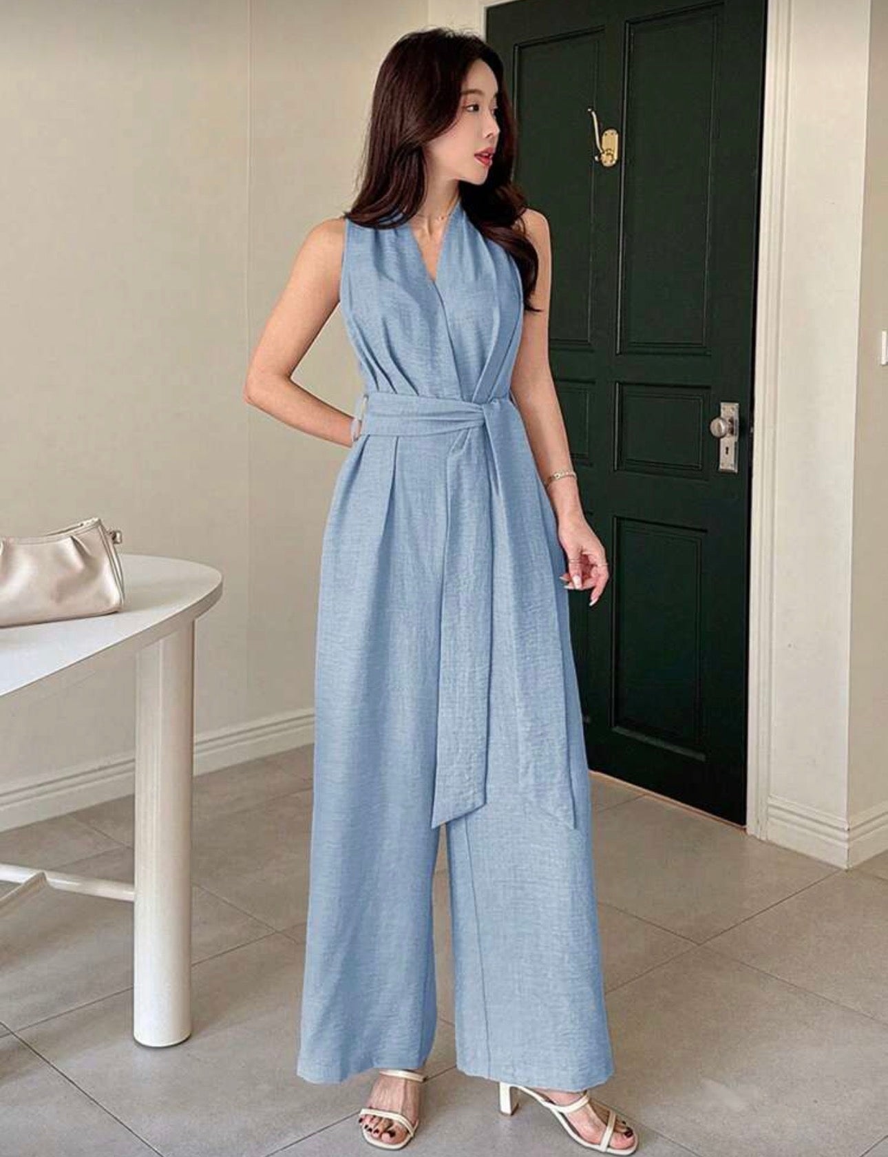 Jumpsuit azul claro con cinturón