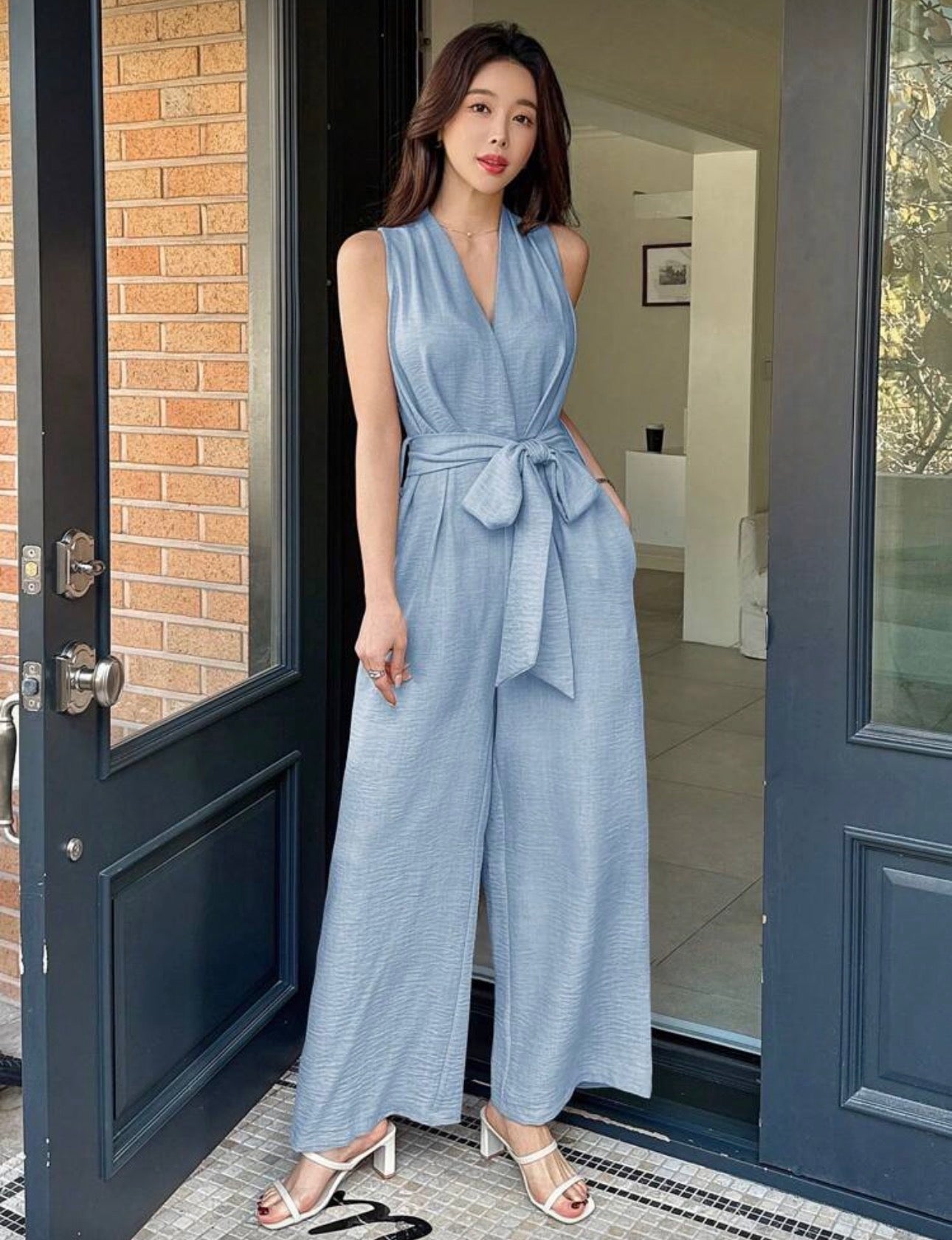 Jumpsuit azul claro con cinturón