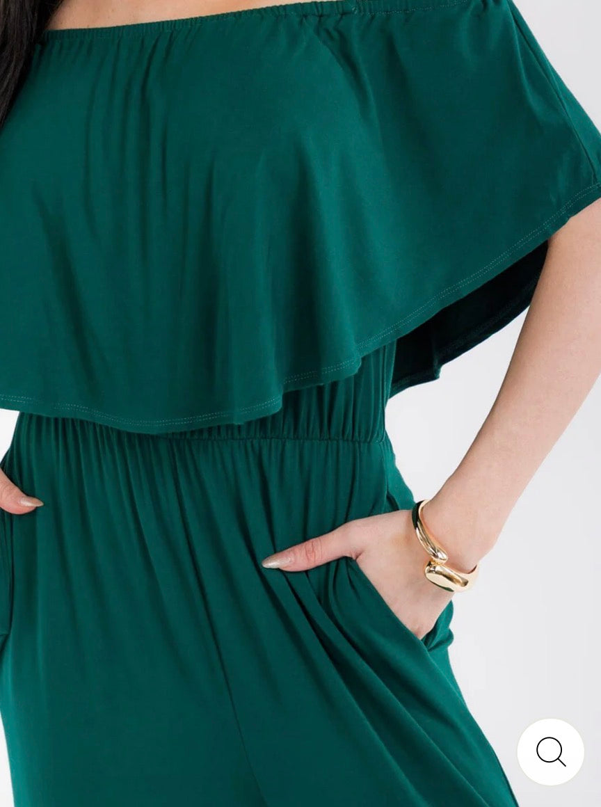 Jumpsuit verde para mujer de manga corta con cintura elástica, bolsillos y pantalón de pierna ancha.