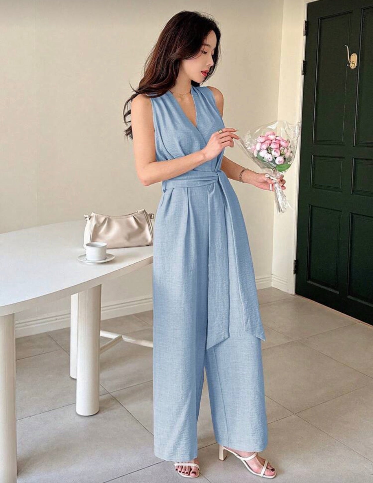 Jumpsuit azul claro con cinturón