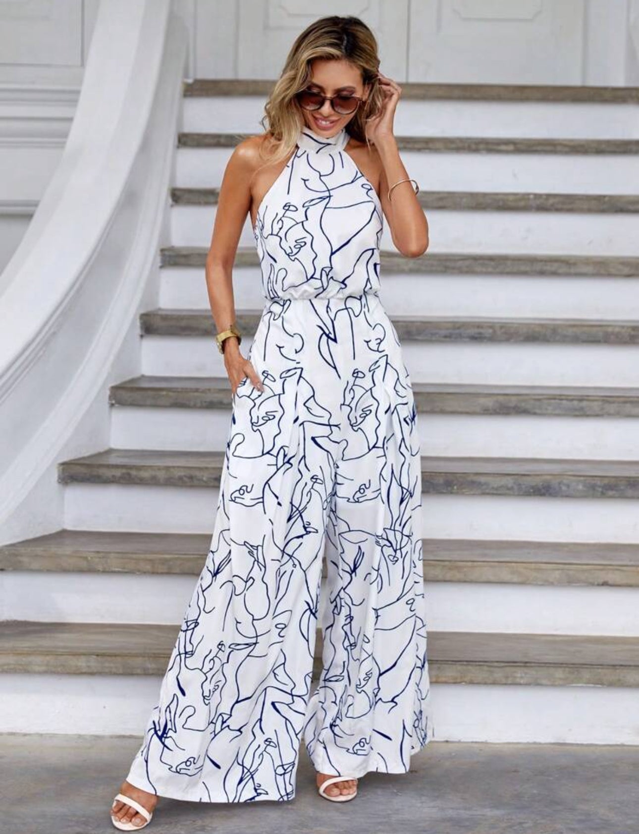 Jumpsuit blanco con lineas azul marino