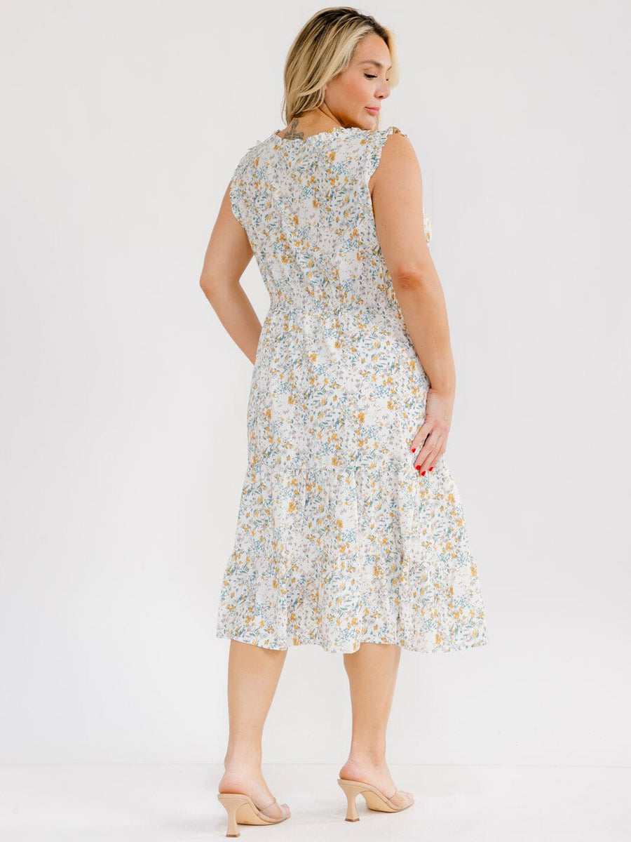 Vestido Plus blanco floral sin mangas y con bolsillos