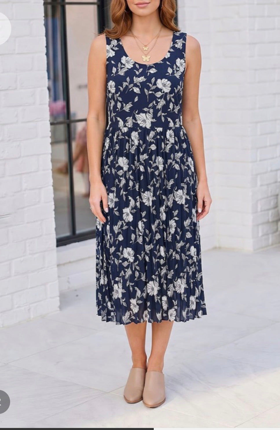 Vestido azul Navy flores blancas miidi sin mangas