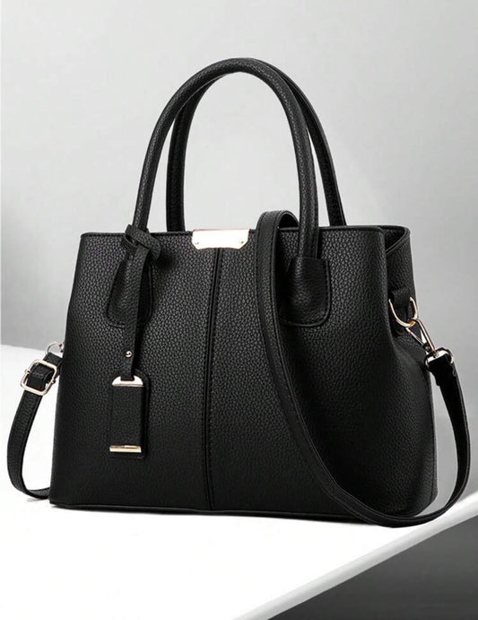 Cartera negra de mano