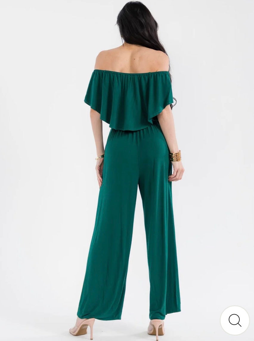 Jumpsuit verde para mujer de manga corta con cintura elástica, bolsillos y pantalón de pierna ancha.