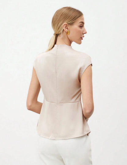 Camisa beige manga casquillo con volantes