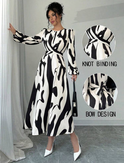 Vestido beige con estampado negro cruzado