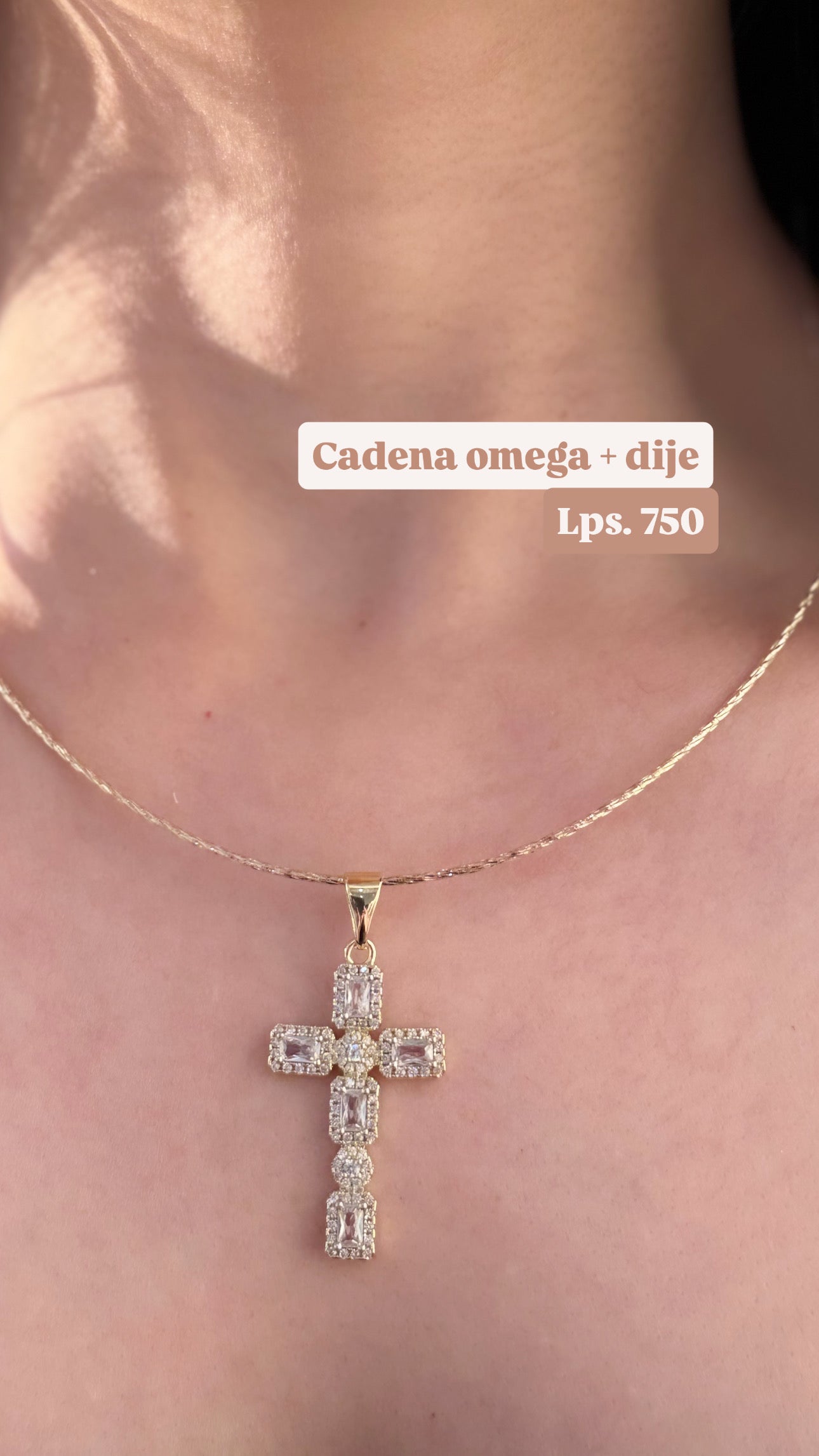 Cadena omega y dije de cruz
