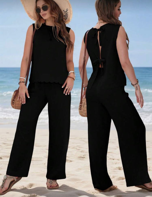 Conjunto negro con lazo