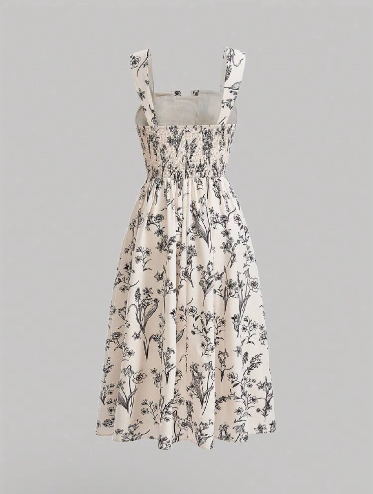 Vestido beige con estampado floral negro