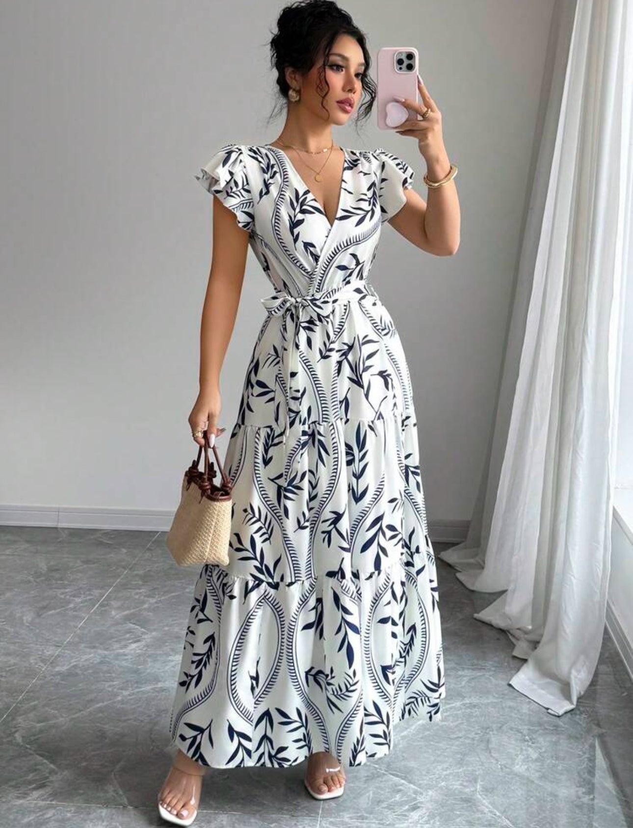 Vestido blanco largo estampado azul cuello V
