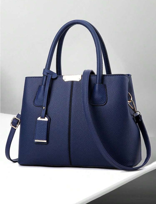 Cartera azul de mano