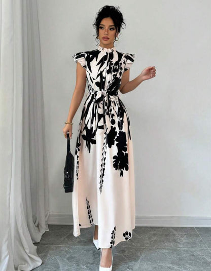 Vestido beige largo y elegante con estampado floral color negro