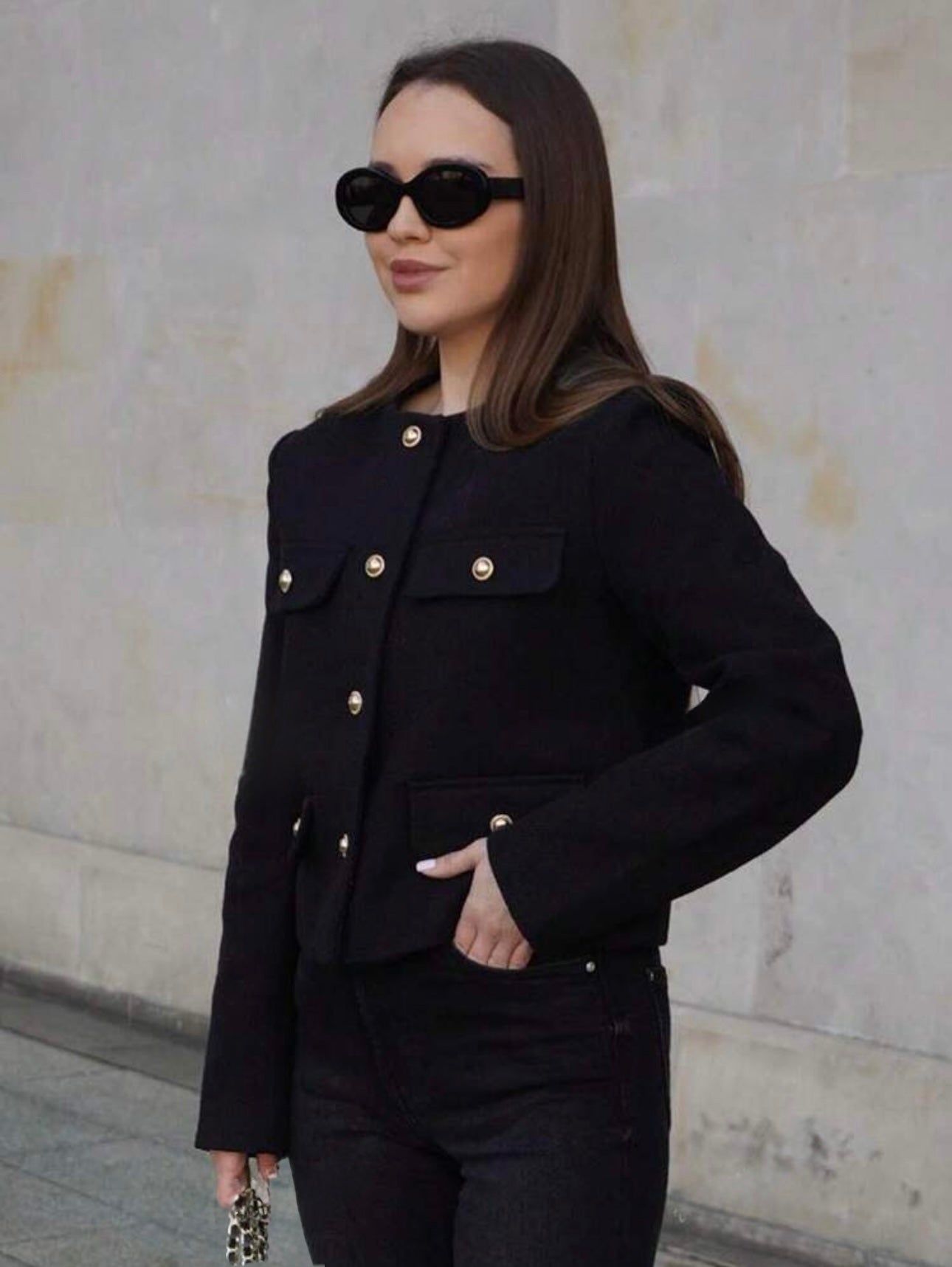 Chaqueta negra botones dorados
