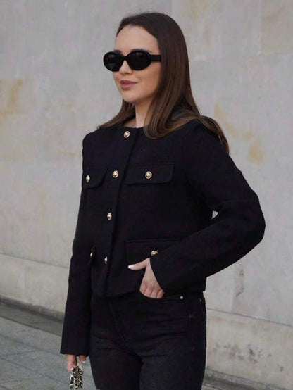 Chaqueta negra botones dorados