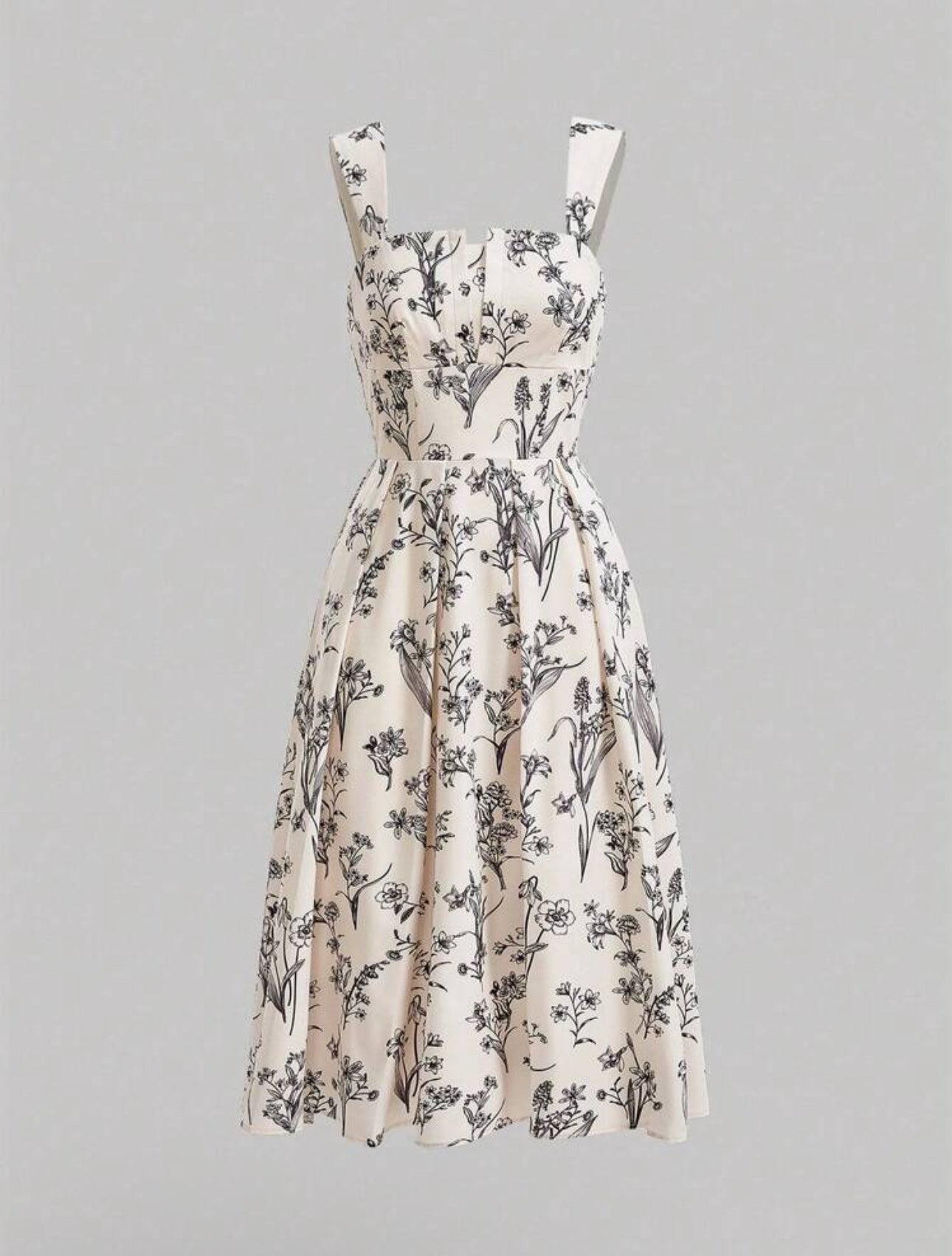 Vestido beige con estampado floral negro