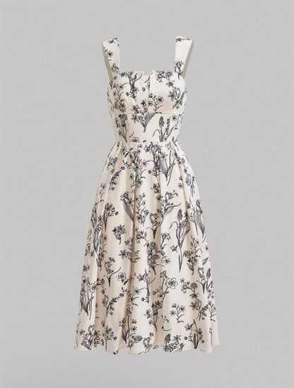 Vestido beige con estampado floral negro