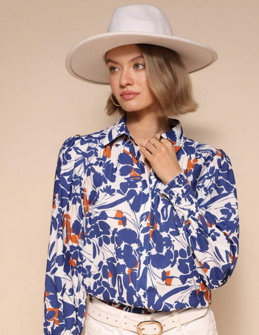 Camisa azul y anaranjado con estampado floral