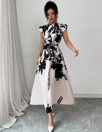 Vestido beige largo y elegante con estampado floral color negro