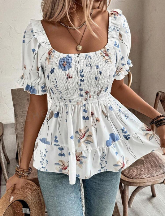 Camisa blanca con flores celestes