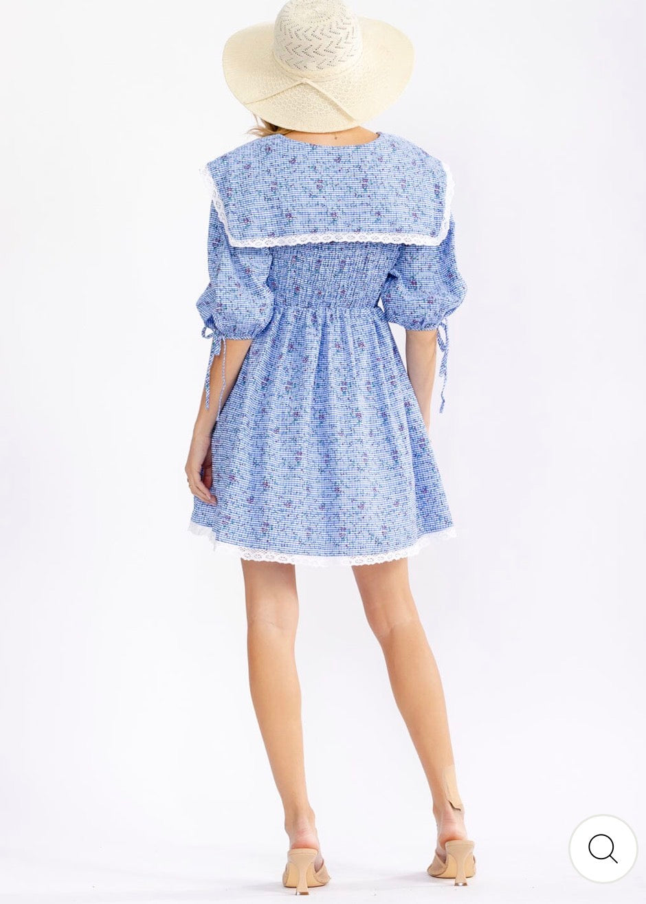 Vestido azul celeste corto con bolsillos