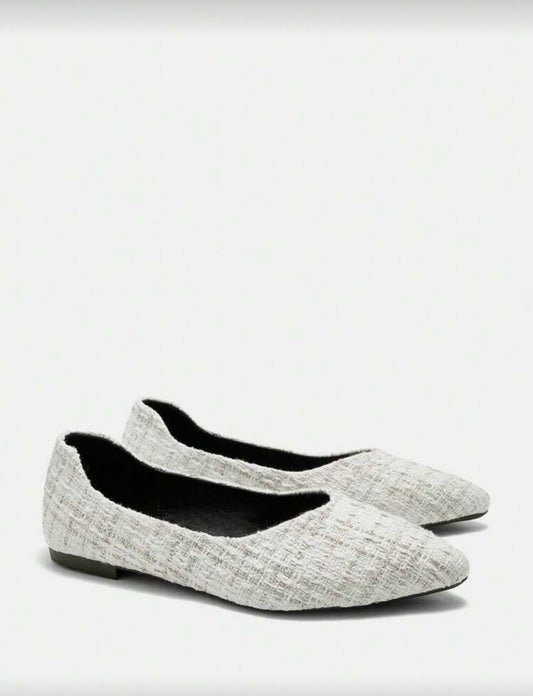 Zapatos planos con detalles plateados