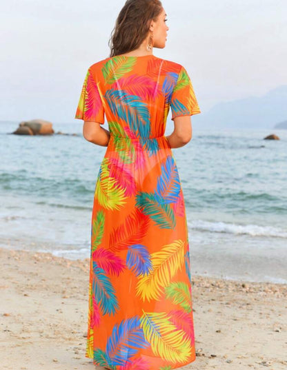 Vestido cruzado estampado tropical tipo salida de playa