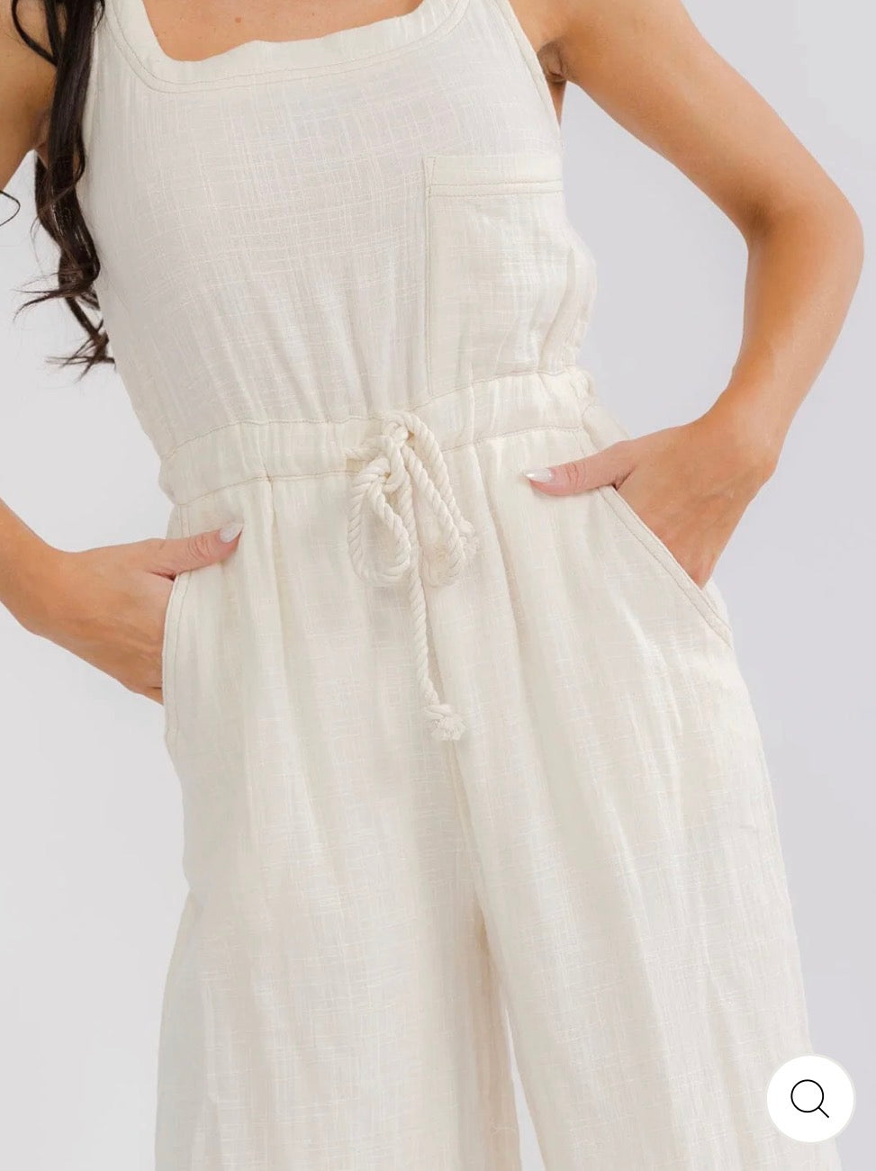 Jumpsuit beige con bolsillos wide leg