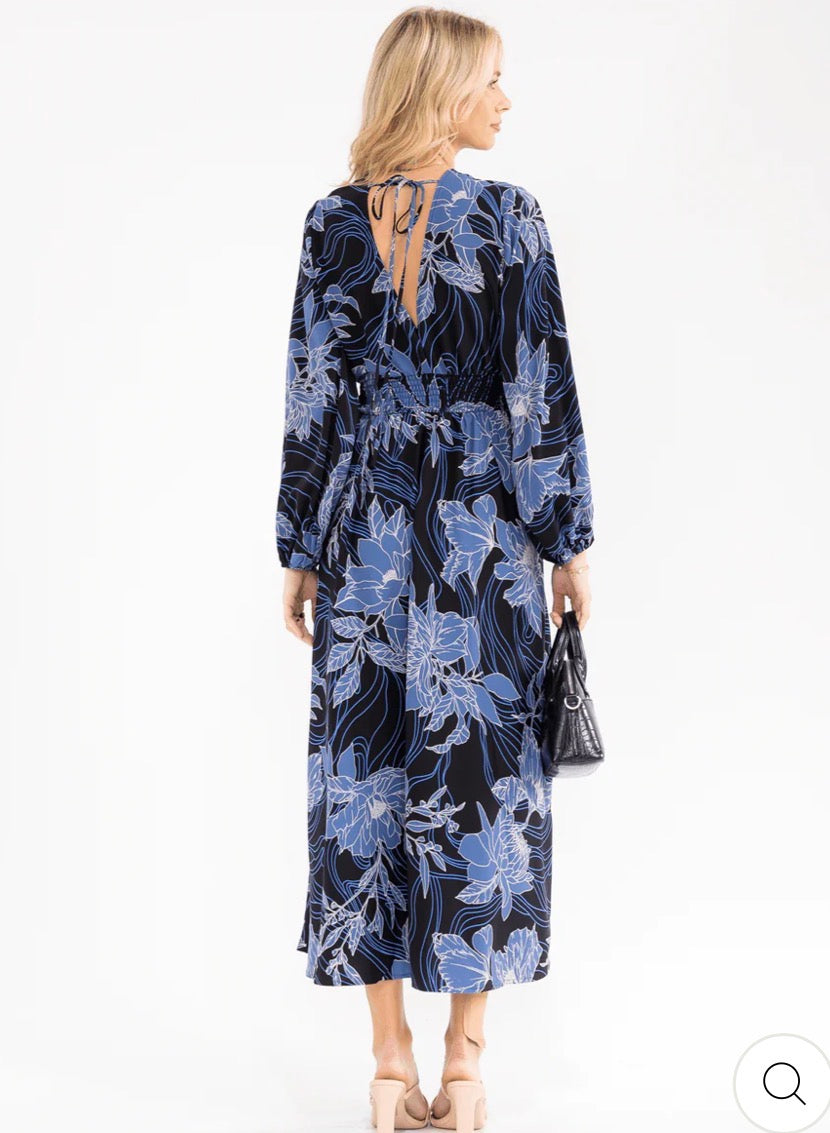 Vestido azul maxi para mujer de manga larga con escote en V, cintura smock y estampado floral.