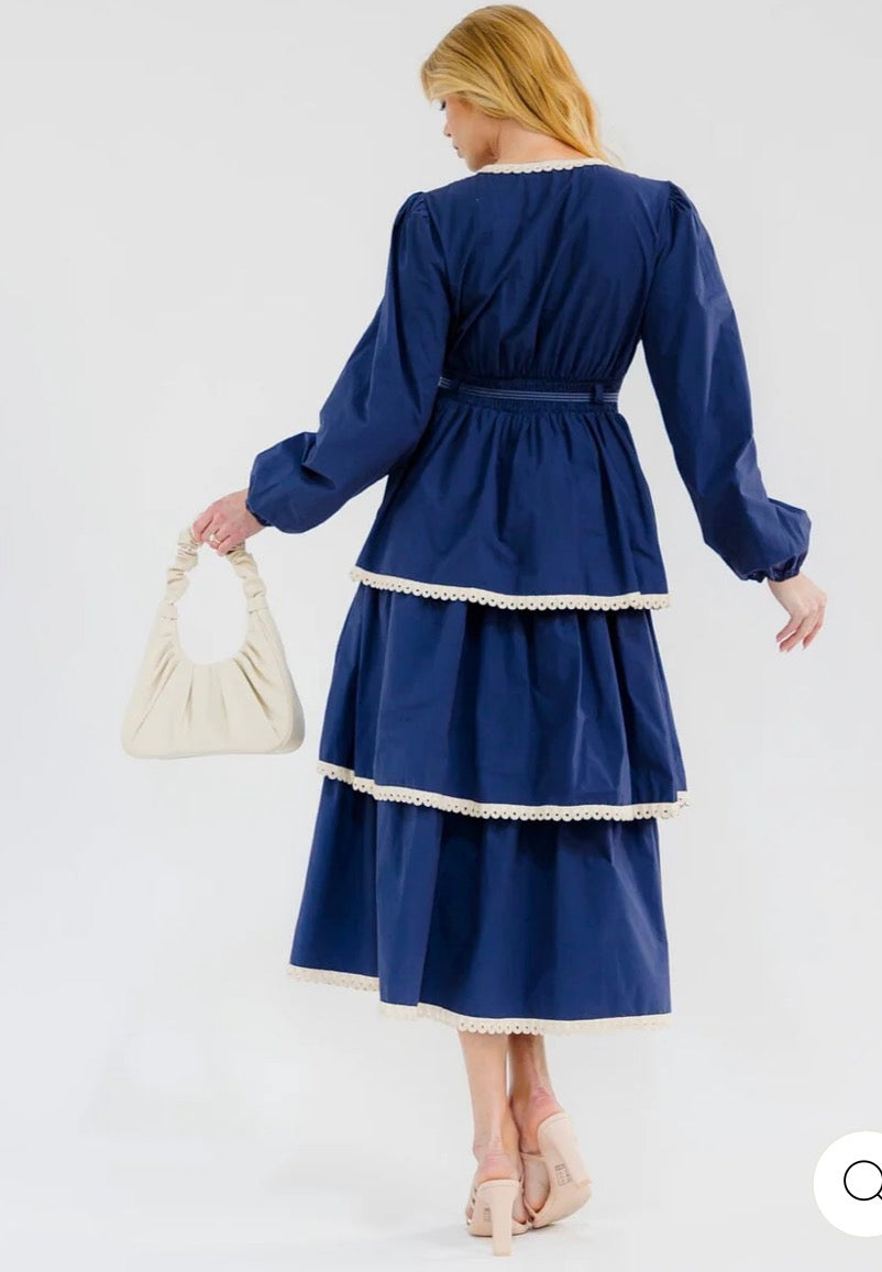 Vestido azul maxi para mujer de manga larga con escote en V, volantes y diseño en capas.