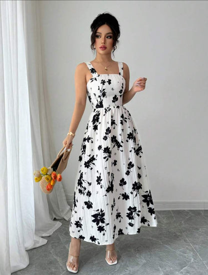 Vestido blanco con estampado floral negro