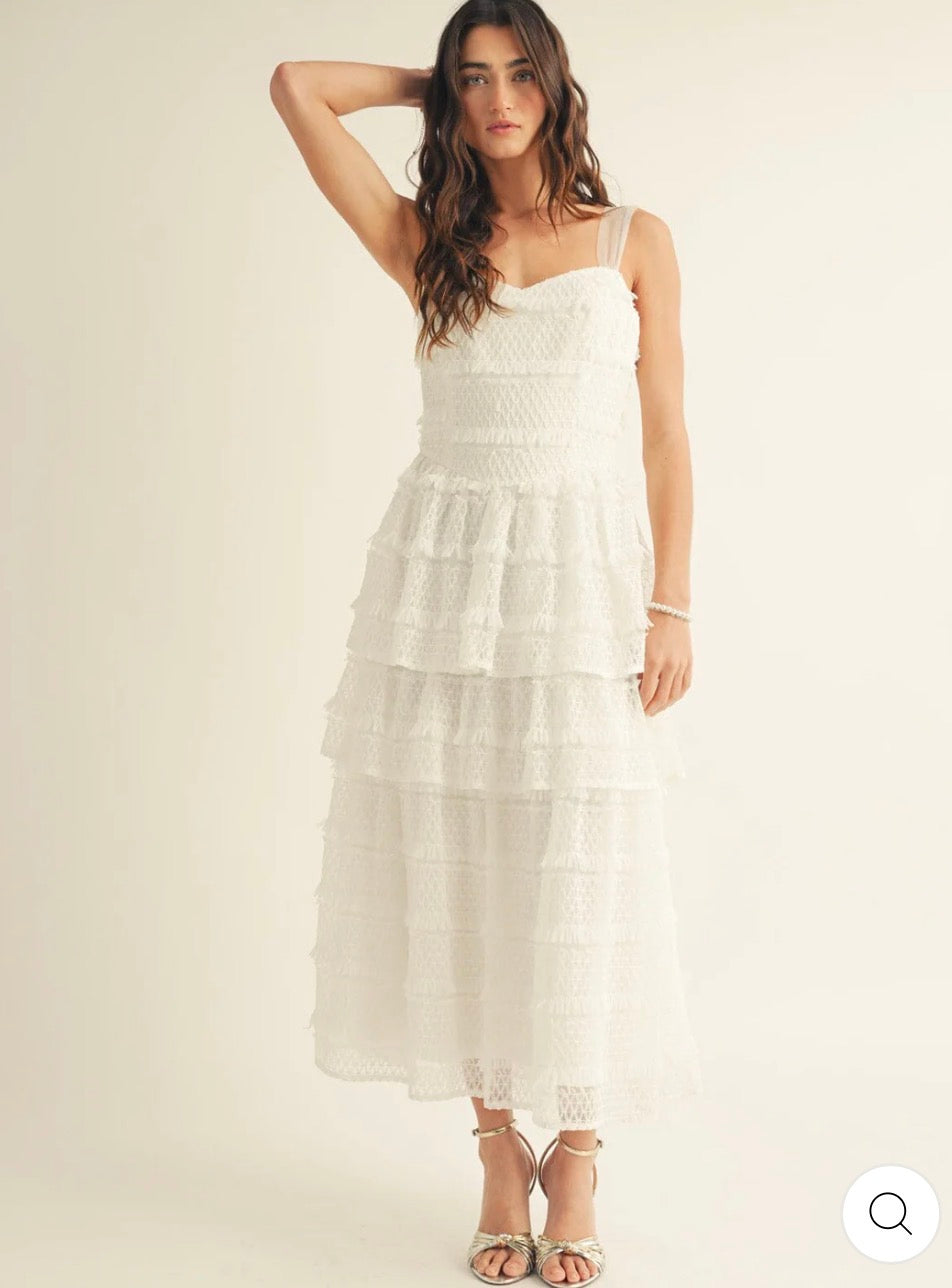 Vestido blanco maxi de tirantes y vuelos