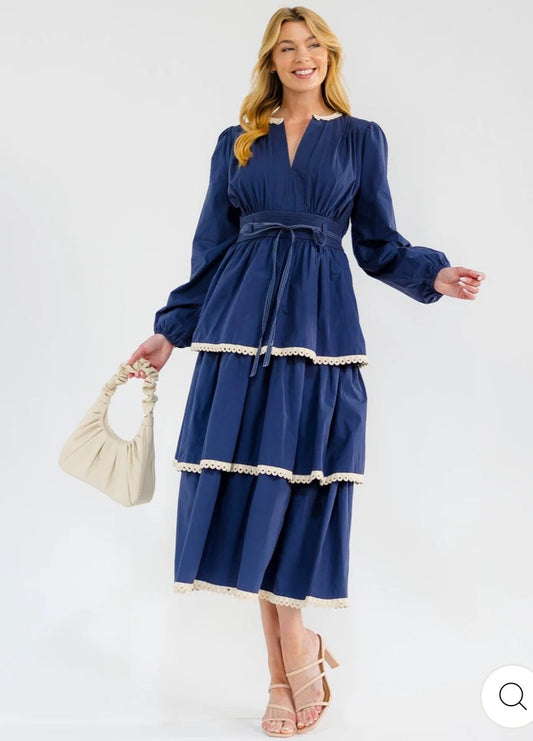 Vestido azul maxi para mujer de manga larga con escote en V, volantes y diseño en capas.