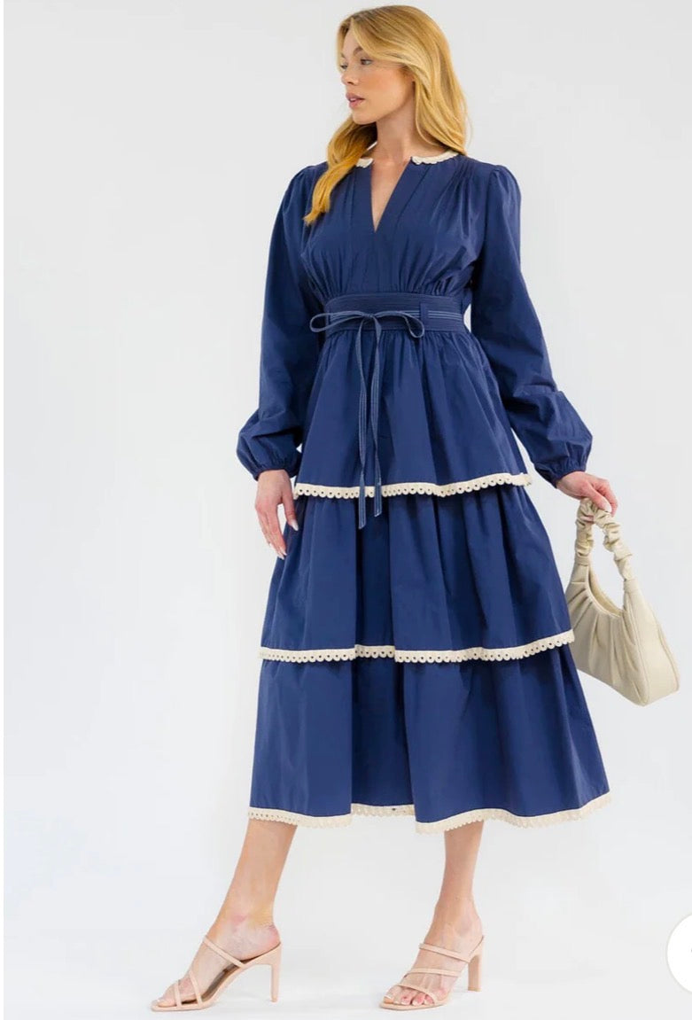 Vestido azul maxi para mujer de manga larga con escote en V, volantes y diseño en capas.