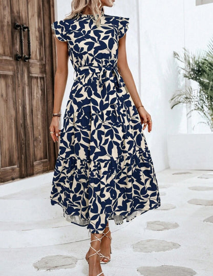 Vestido maxi beige con estampado floral azul