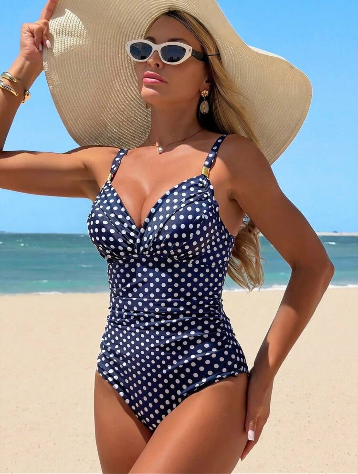 Traje de baño azul polka dot con control abdominal