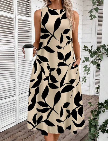 Vestido beige y negro con estampado floral