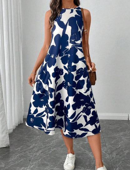 Vestido blanco y azul estilo midi linea A con estampado floral