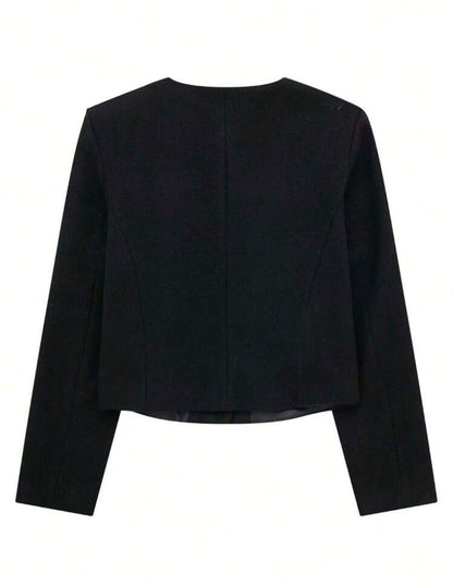 Chaqueta negra botones dorados