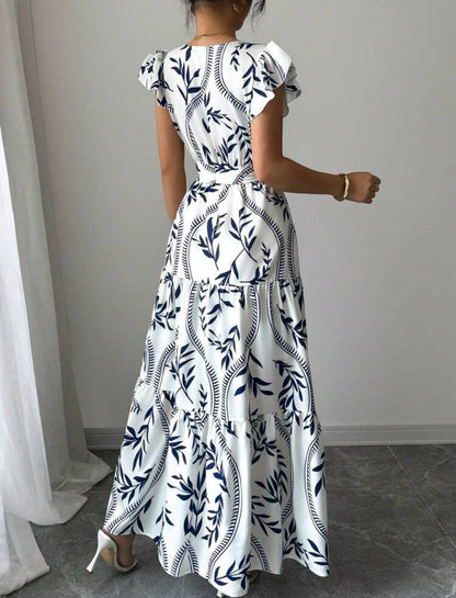 Vestido blanco largo estampado azul cuello V