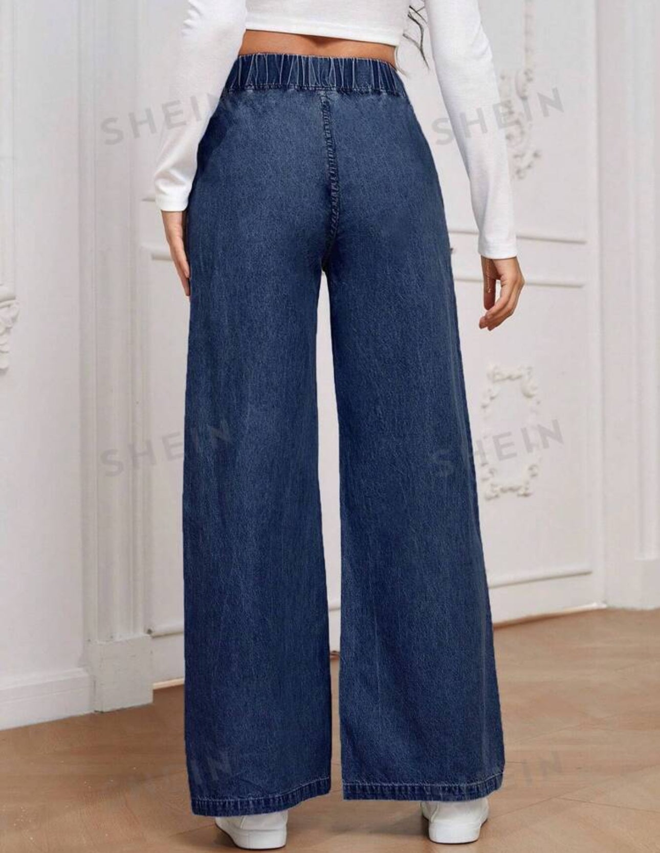 Jeans oscuros con elastico
