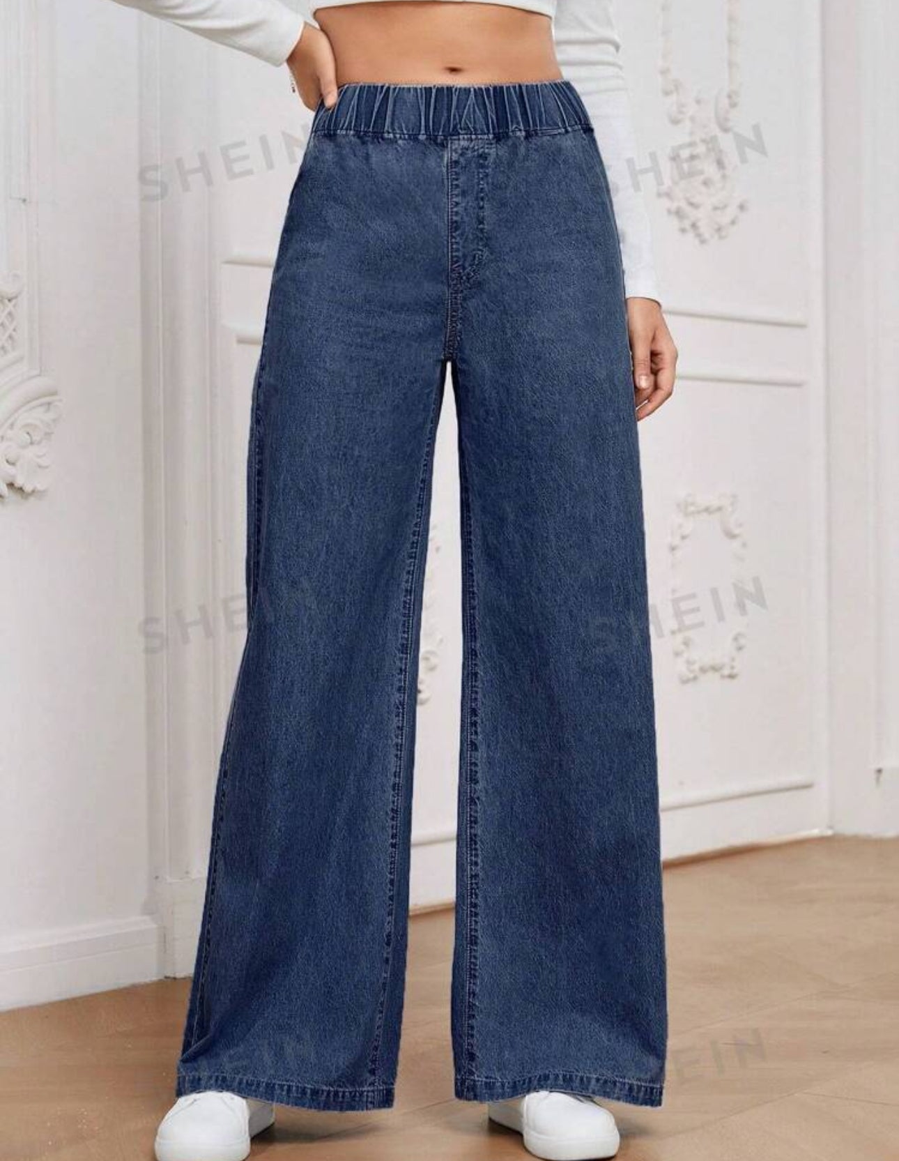 Jeans oscuros con elastico