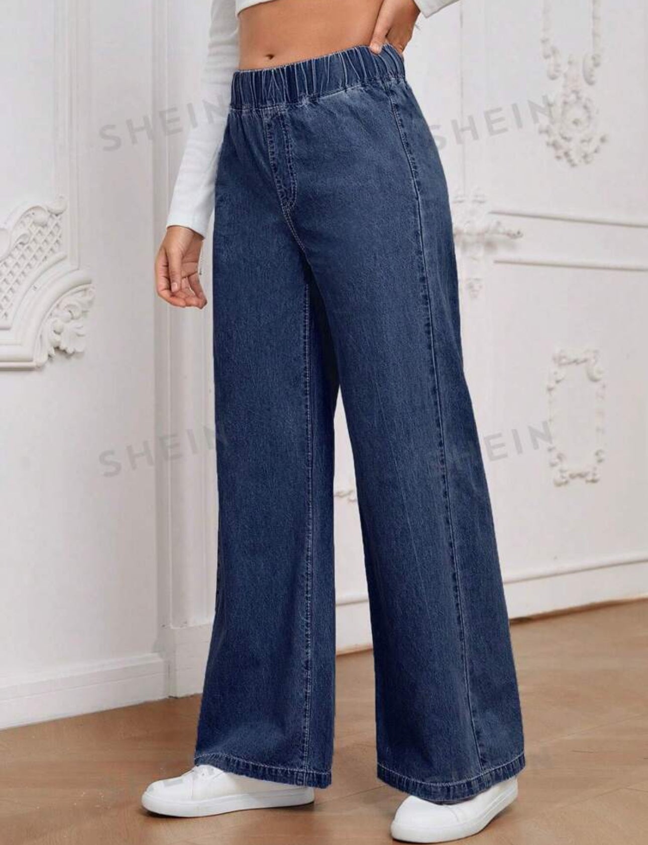 Jeans oscuros con elastico