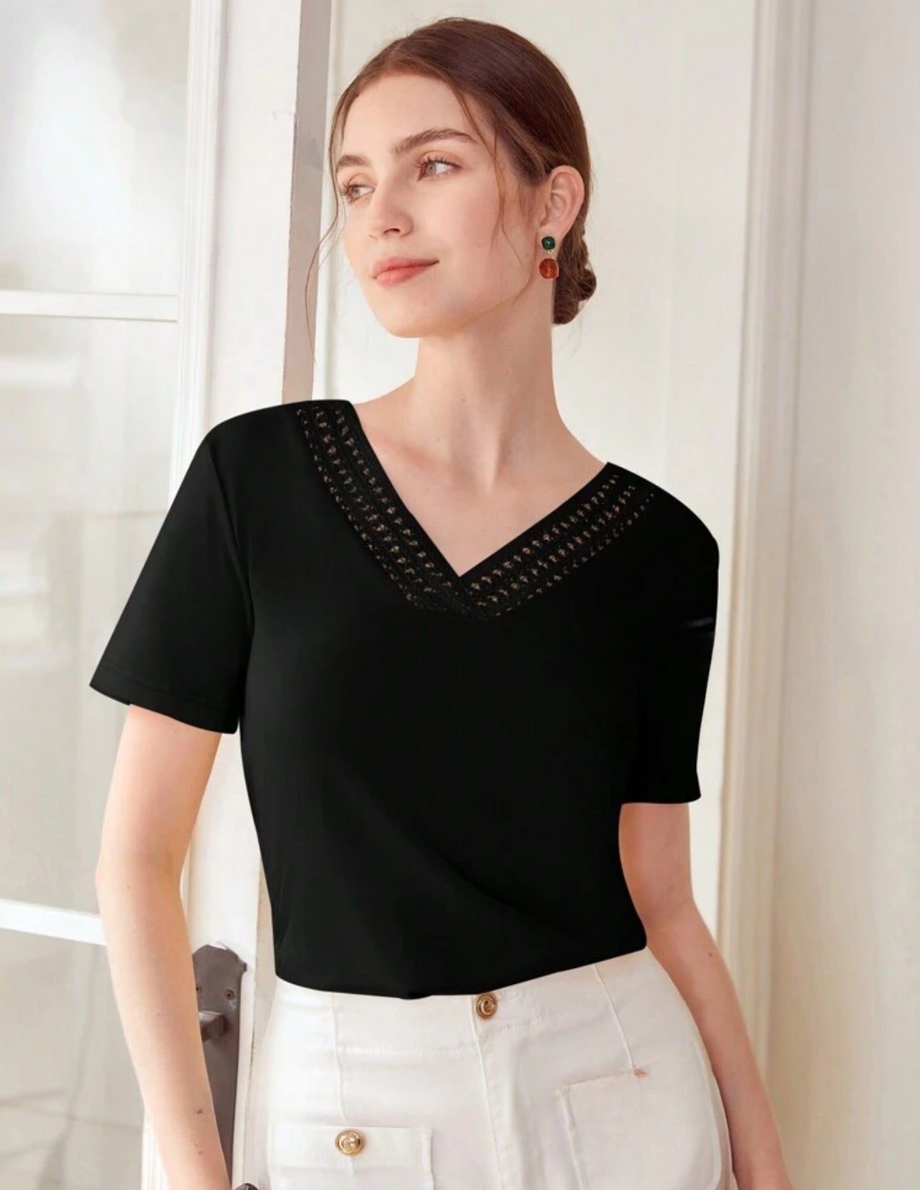 Camisa negra cuello V