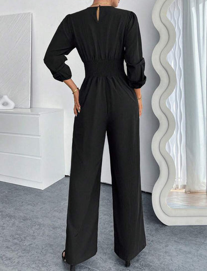 Jumpsuit negro manga larga cuello V