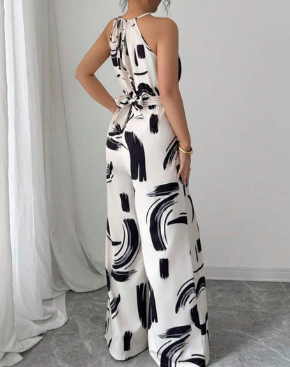 Jumpsuit beige con cinturón con estampado