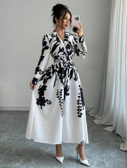 Vestido maxi elegante manga larga color beige con estampado negro